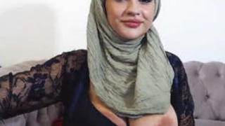 Muslim woman Dalia displays her large breasts in a sensual video