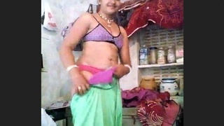 Intimate moment between freshly married couple