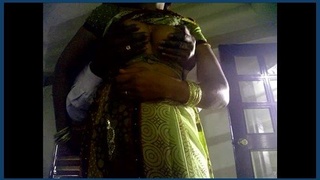 Bhabhi's large breasts receive intense attention