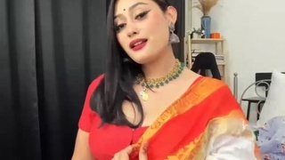Get captivated by cute Anna in a sexy orange saree
