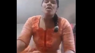 Dissatisfied wife reveals her white breasts to her husband