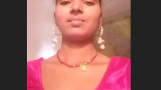 Village girl engages in intimate activity with her partner on camera