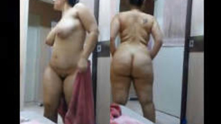 Elderly Indian aunt's voluptuous rear end