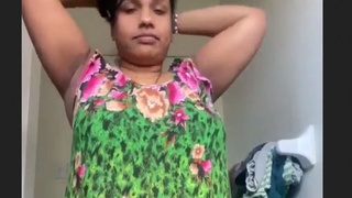 Village aunty with a desi charm and a great physique performing