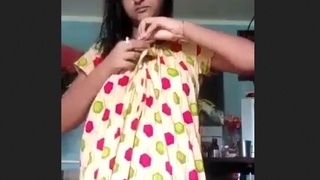 A Bengali woman pleasures herself with her fingers on her unshaved and moist genitals