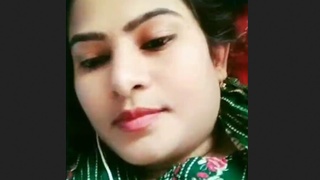 A stunning young woman entices and tempts