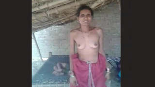 Elderly aunt displays her large breasts and vagina