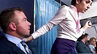 Sexy flight attendant fucks a passenger