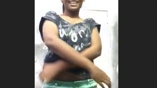 Young adult strips sensually in video