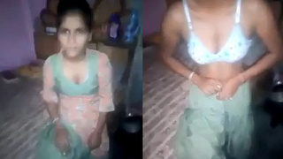 An Indian girl of Desi descent undressing for her male partner