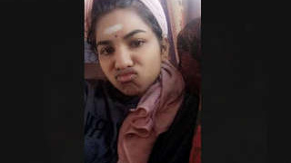 A seductive South Indian girl reveals her breasts and intimate area