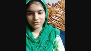 A Muslim woman showcases her large breasts and genitals in a video on VK