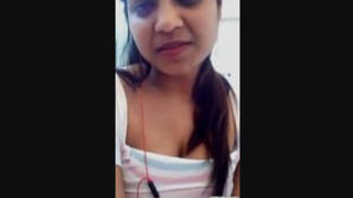 Indian beauty reveals her large breasts in part 2 of this sensual video