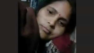 Indian wife flaunts her large breasts during a video chat