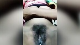 Desi village XXX girl jerking off her black hairy wet pussy on camera