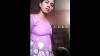 Punjabi housewife performs a sensual striptease in videos
