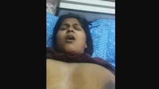 South Asian beauty indulges in sensual activities in a heated recording