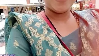 Horny Sangeeta's excitement escalates while flatulating and urinating in the mall's unisex restroom