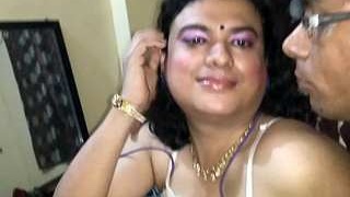 Sultry mature Indian woman confidently displays her assets