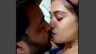 A romantic video featuring a passionate Desi couple kissing