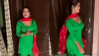 Curvy woman performs sensual dance in traditional Indian attire