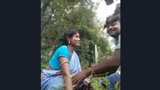 Two Odia individuals engage in intimate outdoor activity