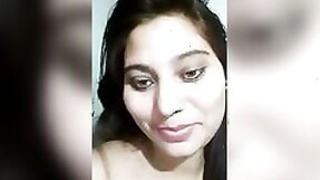 Charming Desi virgin shows her XXX breasts to the camera.