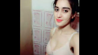 Pakistani college girl with large breasts indulges in provocative behavior on film
