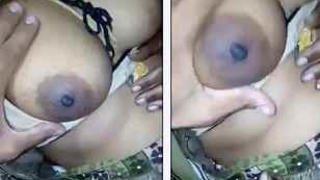 Elderly woman displays her breasts and vagina