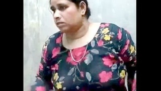 Indian married sister-in-law's nude video featuring an older woman