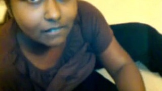 Indian woman in a hotel room