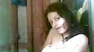 Solo adult teenage girl undresses in front of the camera