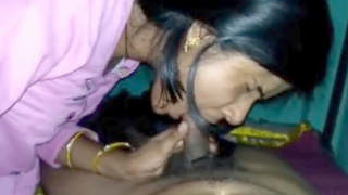 Indian aunty gives a blowjob in the middle of the night