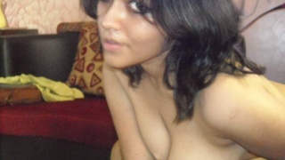 Kiran, a seductive Indian wife, engages in anal sex with her husband's best friend in a video