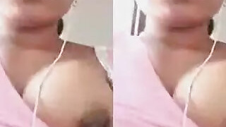 Pretty desi girl's breasts popping out, showing nipple