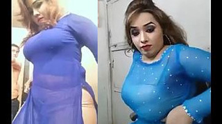 A woman with large breasts wears a see-through dress and creates a sensual atmosphere