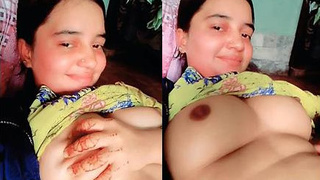 Cute Indian girl with large breasts performs a live show