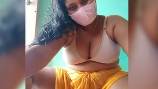 Busty bhabi in a steamy live performance