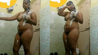 Telugu woman unreservedly displays her bare physique while bathing