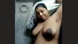 Indian wife reveals her large breasts