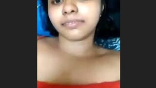 A pretty collegiate lady records a sensual clip featuring herself