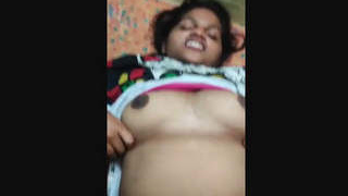 A bald Indian woman's vagina is vigorously penetrated by a man from the same ethnic background