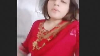 Alice, the attractive young woman, proudly displays her lovely pussy in this sensual video