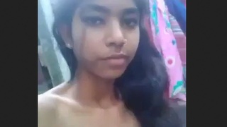 Young woman displaying her assets, featuring a desi bhabi
