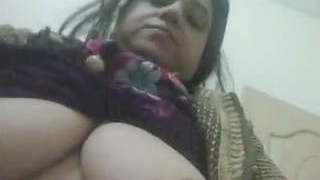 Pakistani aunty in traditional salwar outfit reveals her breasts and genitals