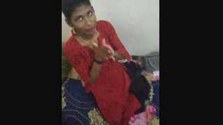 An Indian girl of Desi origin displays her breasts