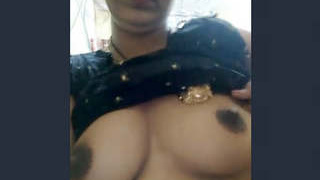 Seductive wife reveals her breasts