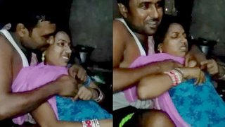 Passionate Desi couple explores sensual boob caress in bedroom