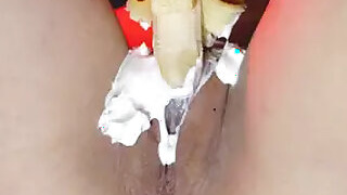 Vagina eats a banana with whipped cream