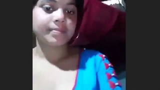 A well-endowed mother displays her large female anatomy